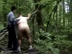 Spanked and belted out in the woods